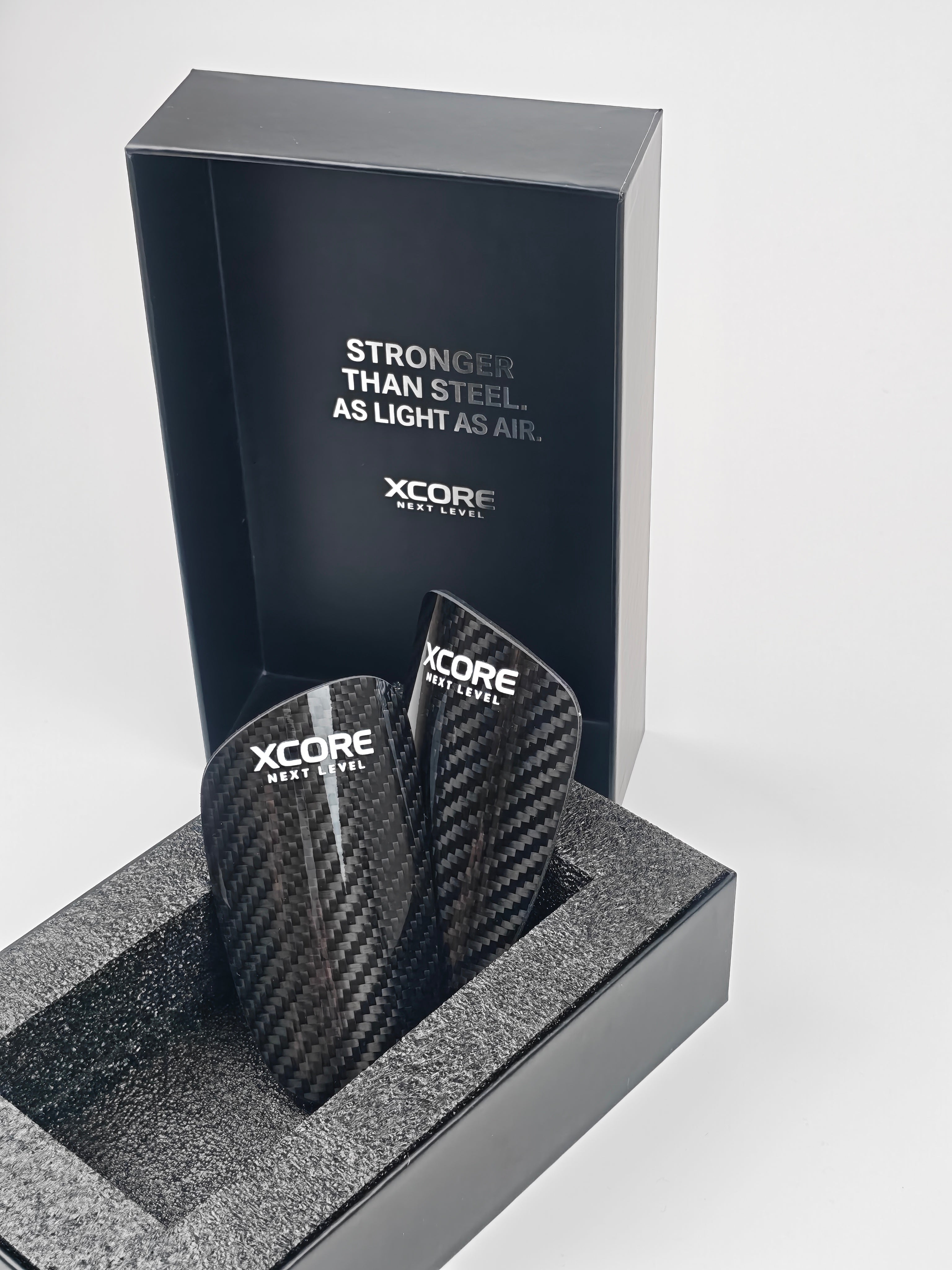 XCORE ORIGIN — The Carbon Shield